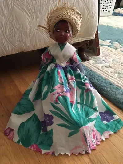 I have a beautiful collectible handmade doll purchased to add to my collection, made by local artisa...
