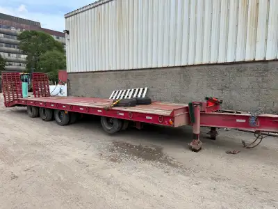 3 fixed axle plus lift axle 30’ deck 5’ beaver tail and 192” wide 2006 Milano trailer Not safetied a...
