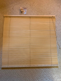 Plastic off-white 45” x 45” louvered, corded window blind