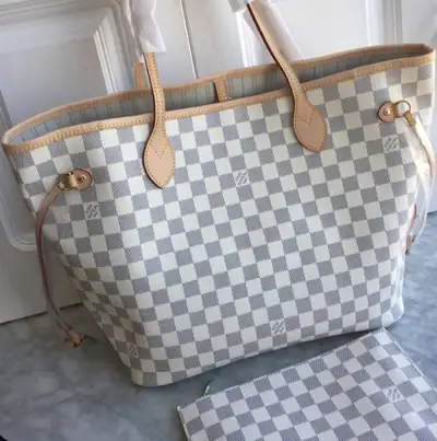 Brand new Louis Vuitton Neverfull MM in the Damier Azur pattern, a stylish and practical tote bag. T...