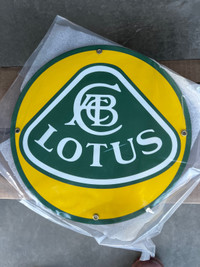 Lotus 12” Garage or Room Wall Sign. New. $40 obo.  