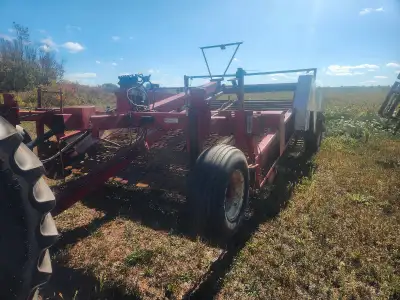 4 row allan windrower field ready. currently hooked up rleady to go. 3 new primary webs. lots of spa...