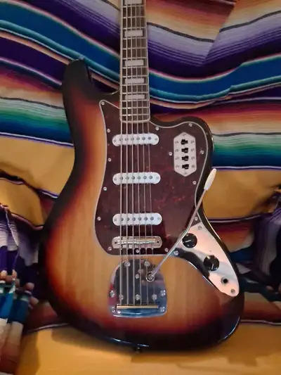 Not a regular Bass, not a baritone. This is very unique guitar with so much versatility. Was origina...