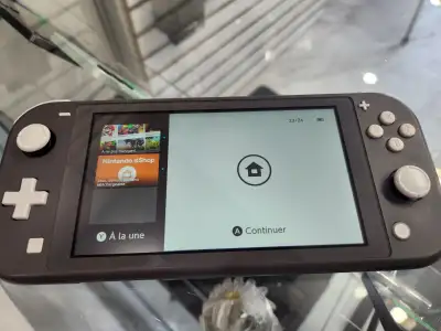 Nintendo Switch Lite comme neuve –, View more