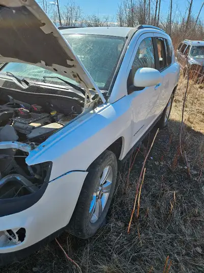 2014 Jeep compass (PARTS ONLY) take whole unit as is. Interior is no good and transmission is shot....