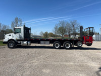 2009 Volvo flatbed with Moffat 