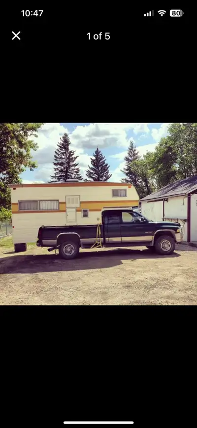 Get ready for your next adventure with this truck bed camper! While this camper has been well-loved,...