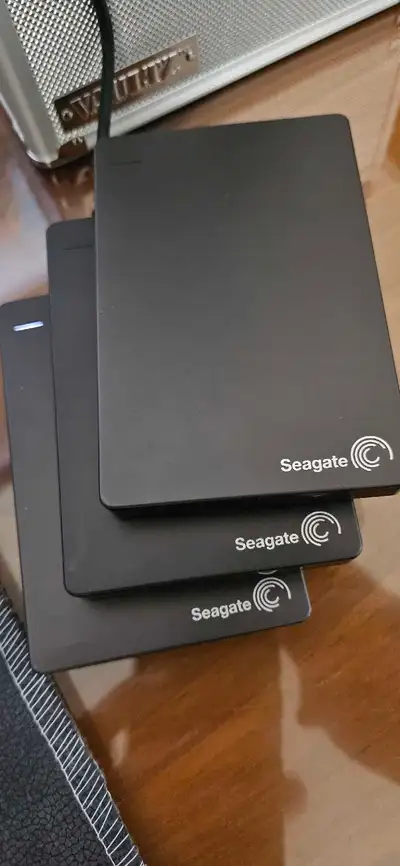 Three Seagate 2TB Backup PLUS externals available. EACH $70 and comes with a data cable. USB 3.0 spe...