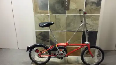 Velo Dahon pliable rouge presque neuf 1 vitesse freinage par retro pedale $200 Dahon foldable red bi...