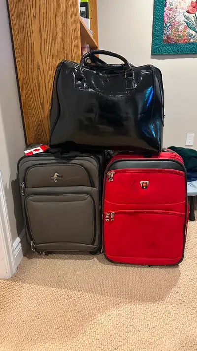 One Atlantic grey weekend suitcase, 21"x14.5"x9" @40.00. The other two are sold.