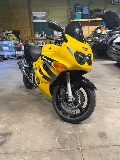 2004 Suzuki Katana. Fantastic bike, I just never ride it. Aftermarket led lights slip on exhaust new...