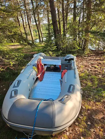 Innovation 11 ft inflatable boat aluminum floor keel wheel set 4 launching boats 3 years old like ne...