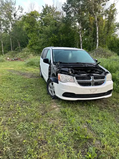 Part out, dodge grand caravan, motor blew head gasket, has stow and go, message with needs