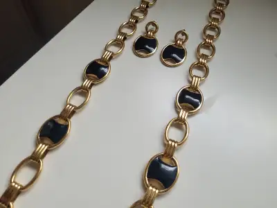 Vintage Monet Gold Tone and Blue Enamel Necklace and Earrings, View more