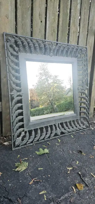 Decorative mirror with metal frame, View more