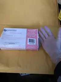 8 new boxes of Vinyl medium cleaning gloves 
