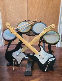 PS 3 Rock Band guitars and drum set 