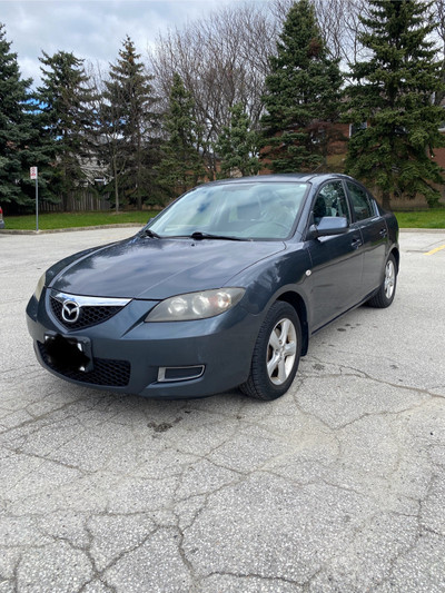 2009 Mazda 3 Sedan 5 Speed Manual: Reliable Ride with Recent Rep