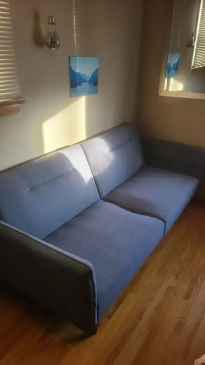 Couch that doubles as futon. Pick up only.