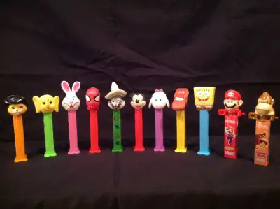 PEZ DISPENSERS (11 VARIOUS VINTAGE), View more