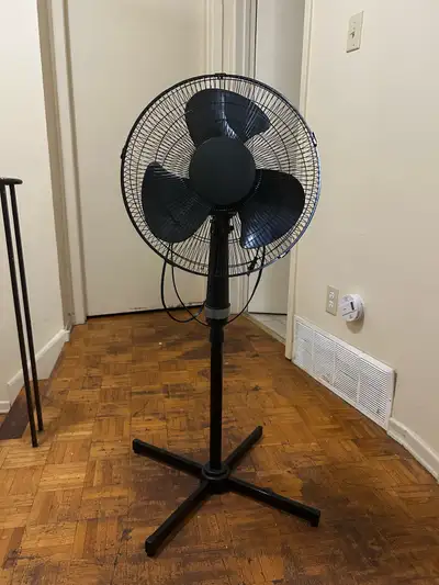 Stay cool with this black standing fan, perfect for any room needing a breeze. This fan has been rel...