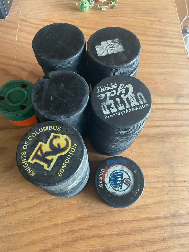 26 lightly used hockey pucks in Hockey in Edmonton - Image 4