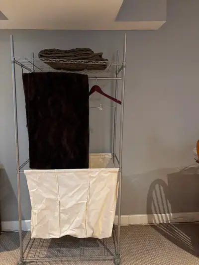 - 3 sections for sorting laundry (ivory) - sturdy rack for stacking folded clothes or hanging to dry...