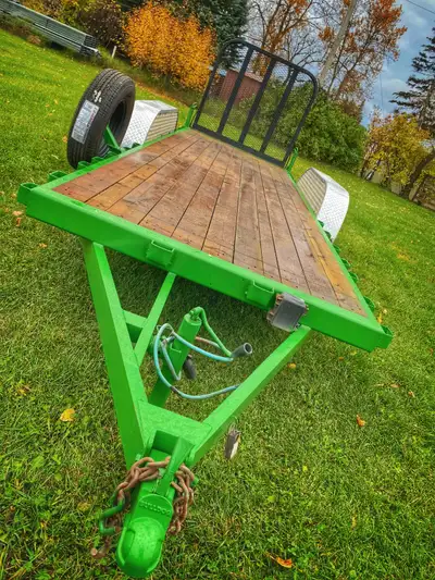 PJ Tandem Axle flatdeck trailer in sharp John Deere green. 5’ X 15’, 2-3500 lb axles. Newly sandblas...