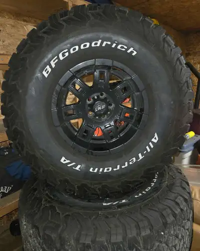 Priced to Sell. 4 - BFG A/T 33/12.5R18 (like New) 1 - spare Goodyear Duratrac (New) 5 - Mickey Thomp...
