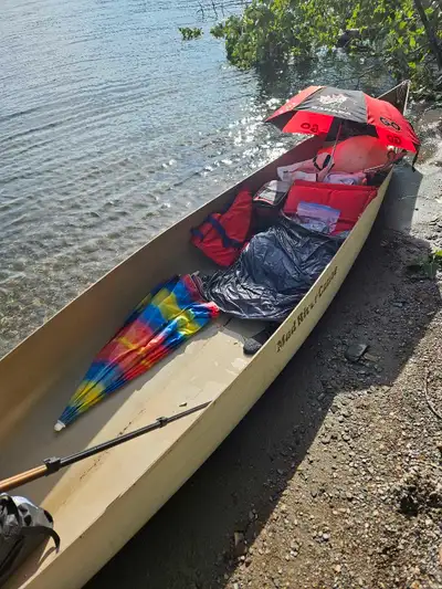 16ft. Mad river canoe. Would like to trade for a working ,outboard or a dinghy with a hard trosum.