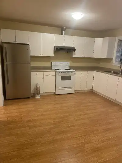 Two bedroom basement suite in a big house. Quiet, Clean, Safety, Close to schools. Utilities, intern...