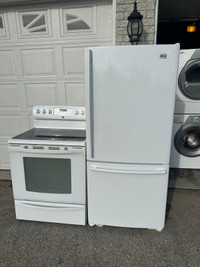 SERIOUS INQUIRIES!! Fridge 450$ and stove 450 can deliver