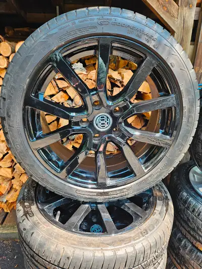 Gloss black spoke rims 17 inch off Mazda 3. Tires are 215 45R 17 with maybe 1 season left. Pick up H...