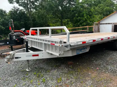24 foot 14k Martin deck over aluminum trailer 2024. Comes with removable ramps. Contact Leonard Penn...