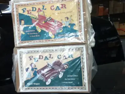 HAVE TWO 1.3 scale PEDAL CARS,die cast metal , one RANCH WAGON and one HOOK AND LADDER