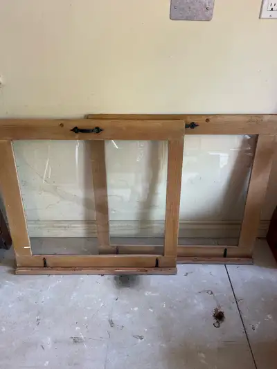 These two vintage windows, each measuring 29.5” x 30.25”, feature a charming, rustic aesthetic, perf...