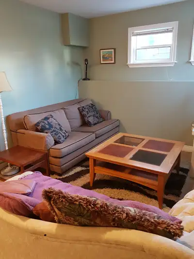 Tired of apartment high-rises? Enjoy this fully furnished apartment in quiet residential area in con...