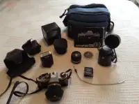 Caméra reflex argentique 35 mm Olympus OM-10 + accessoires