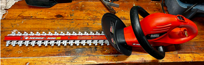 This electric powered device is used for trimming hedges and shrubberies. Hand held shear and lopper...