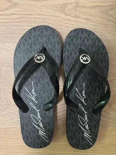 Michael Kors women’s flip flops size 7- never been worn, View more
