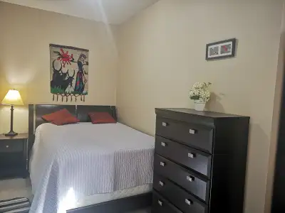 This fully furnished Bachelor Suite with separate entrance is in Eagle Ridge: Only one to two minute...