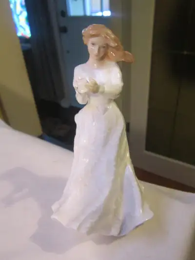 This figurine is in good used condition with no damage. It measures 6 inches tall, 3 inches long, an...