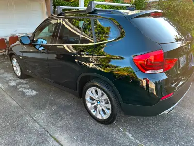 Experience the perfect blend of sportiness and practicality with this well-maintained 2012 BMW X1 xD...
