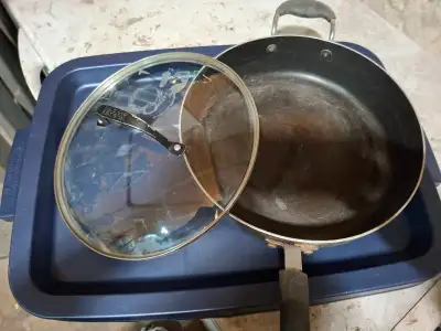 Free large cast-iron pot and a large pan, View more