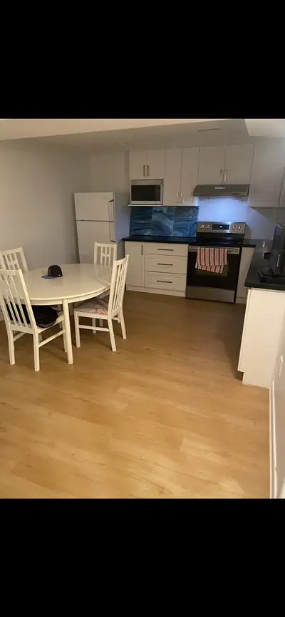 Renting 2 bedroom + den two bathroom basement apartment Private en suite laundry one parking include...