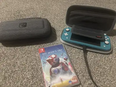 Barely used, Like new, Turquoise edition. Charger included. Includes the game No Man's Sky and 2 cas...