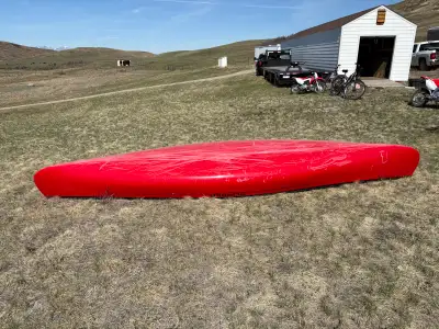 This is a red Clipper 16 Prospector canoe, perfect for exploring lakes and rivers. This canoe is in...