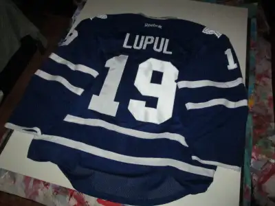 This is a game used jersey worn by Joffrey Lupul during his tenure with the Toronto Maple Leafs. Fro...