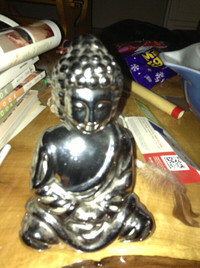 Silver Buddha figure for sale