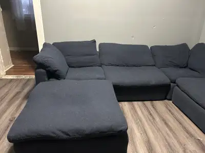 Leon’s sectional with two ottomans, View more